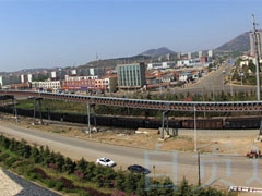 日照嵐山港鐵礦石輸送大型管帶機係統工程重載運行成功（gōng）